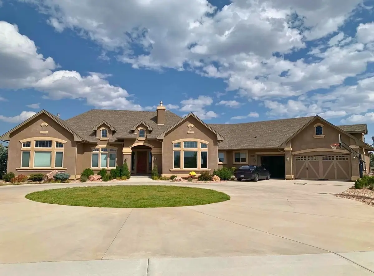 Residential exterior painting and restoration by Gates Enterprises in Colorado